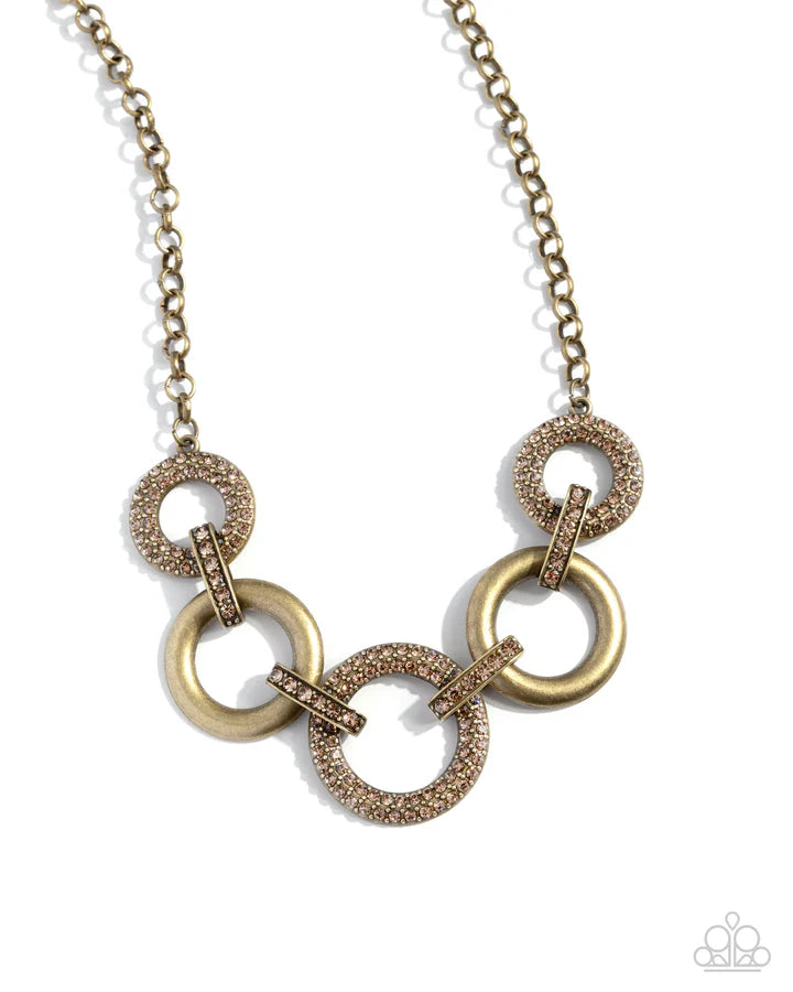 Cosmopolitan Confidence Brass
