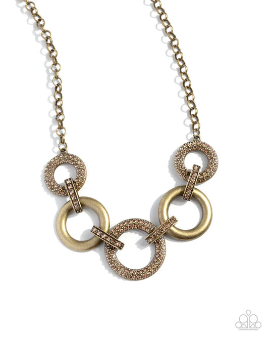 Cosmopolitan Confidence Brass